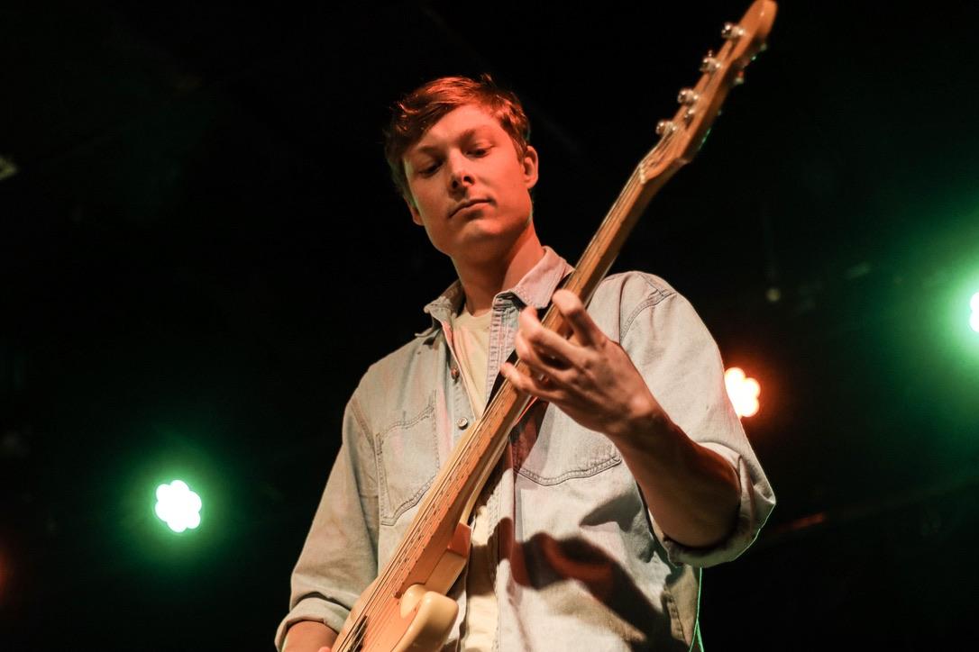 Søren Nissen electric bass under stage lights